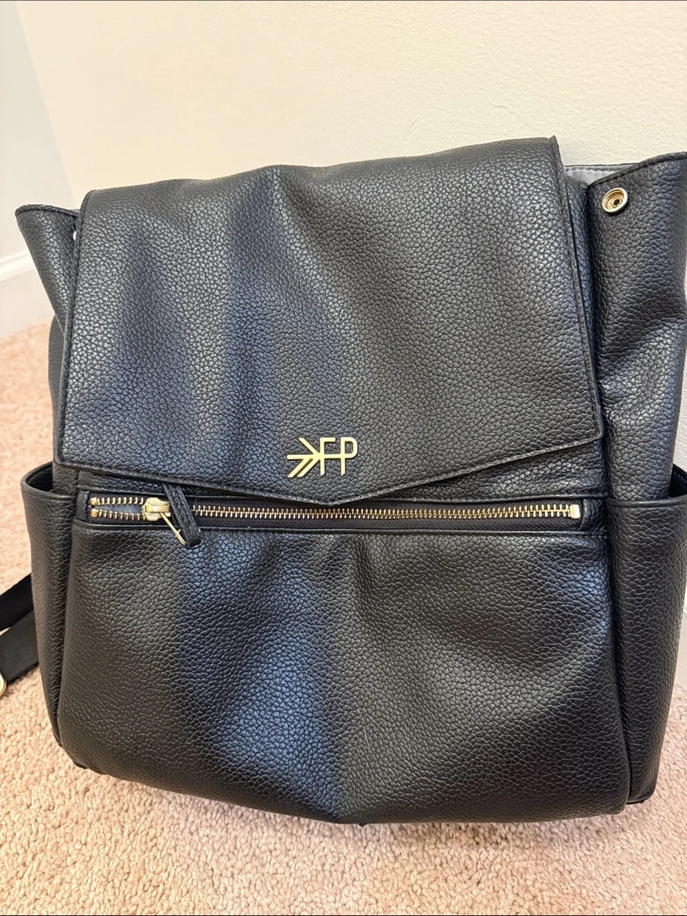 Freshly picked black leather diaper bag